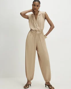 Beige Satin Shoulder Pad Balloon Leg Jumpsuit