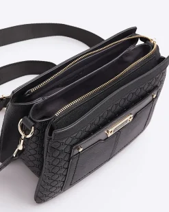 Black embossed monogram cross body bag