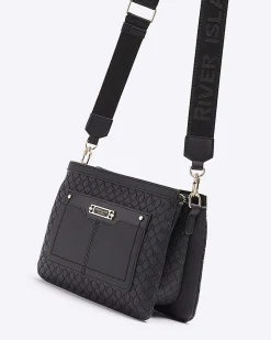 Black embossed monogram cross body bag