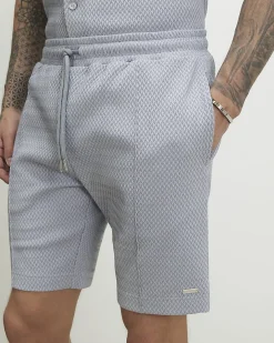 Blue Slim Fit Jacquard Textured Shorts