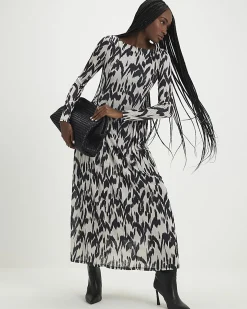 Cream Animal Print Long Sleeve Maxi Dress