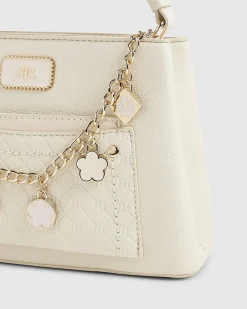 Cream Monogram Pocket Front Charmed Tote Bag