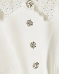 White Frill Sleeve Diamante Peplum Top